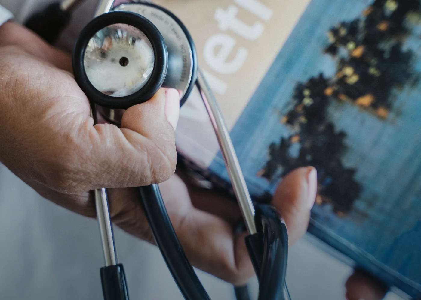 Stethoscope and healthcare documents for international medical cover
